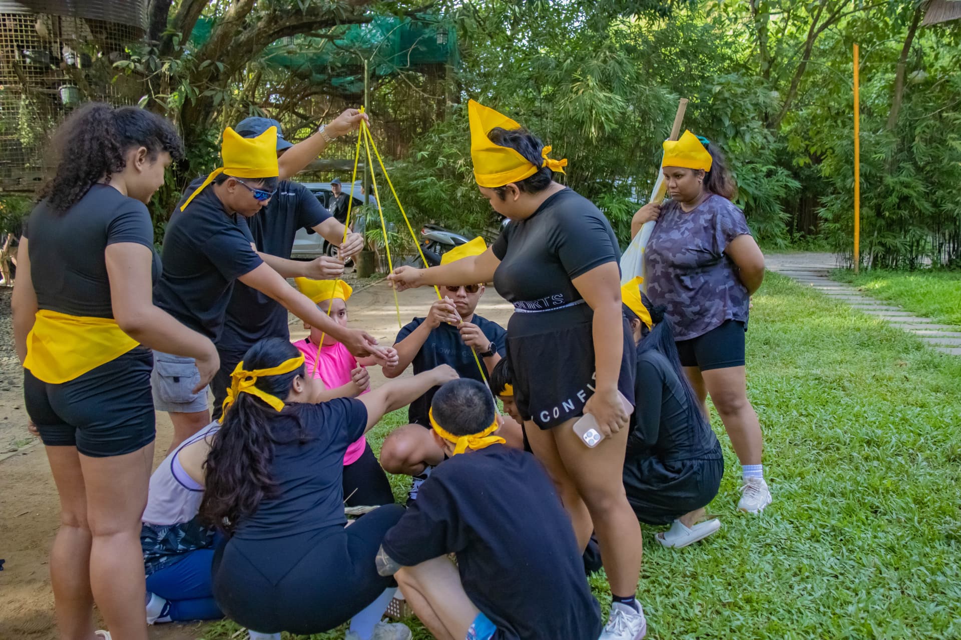 Yellow team building a tower together